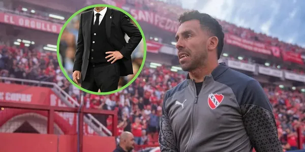 Carlos Tevez junto a un posible DT en la cancha de Independiente.