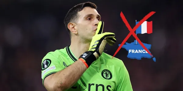 Dibu Martínez pidiendo silencio y la bandera de Francia.