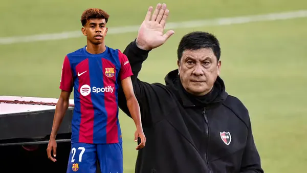 Lamine Yamal con la camiseta de Barcelona y Germán Burgos