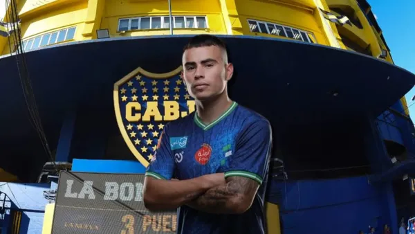 Lucas Zelarrayán cruzado de brazos y detrás La Bombonera.