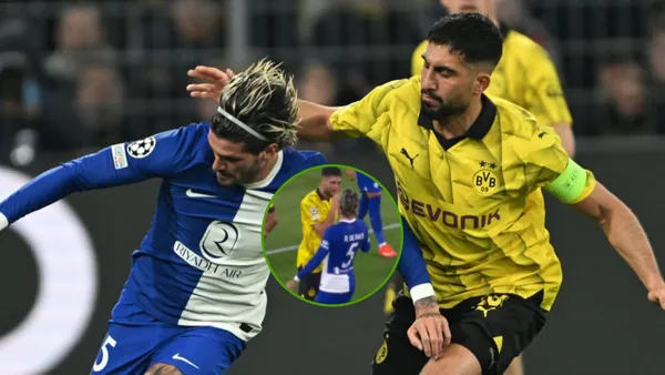 Rodrigo De Paul disputa una pelota con Emre Can