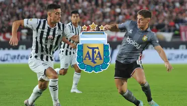 Benjamín Rollheiser disputa una pelota con jugador de Talleres de Córdoba