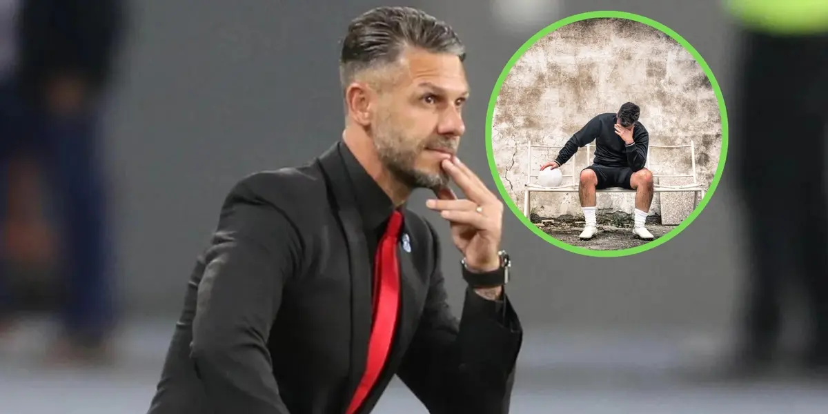 Demichelis junto a un jugador en el banco.