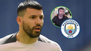 El kun con la boca abierta junto al escudo del Manchester City.