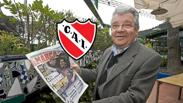 Josep Minguella leyendo un diario que tiene a Lionel Messi en la portada