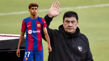 Lamine Yamal con la camiseta de Barcelona y Germán Burgos
