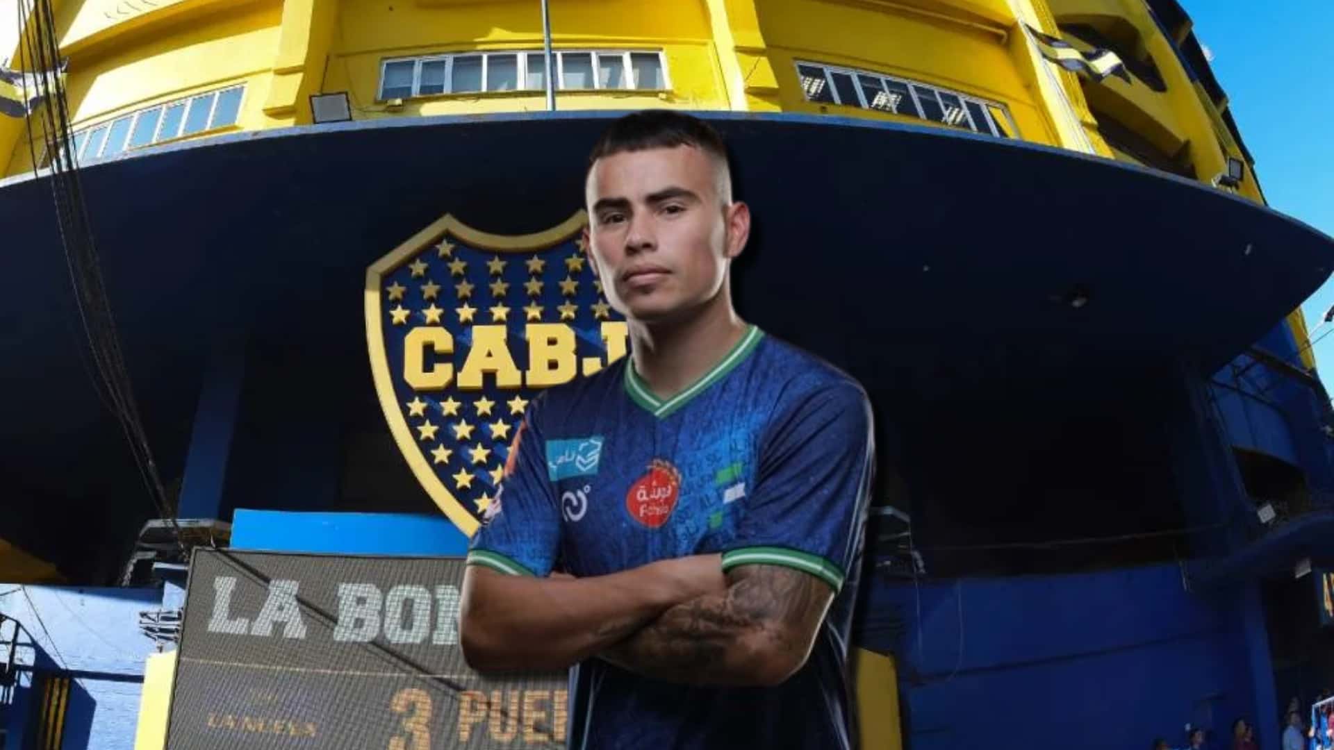 Lucas Zelarrayán cruzado de brazos y detrás La Bombonera.