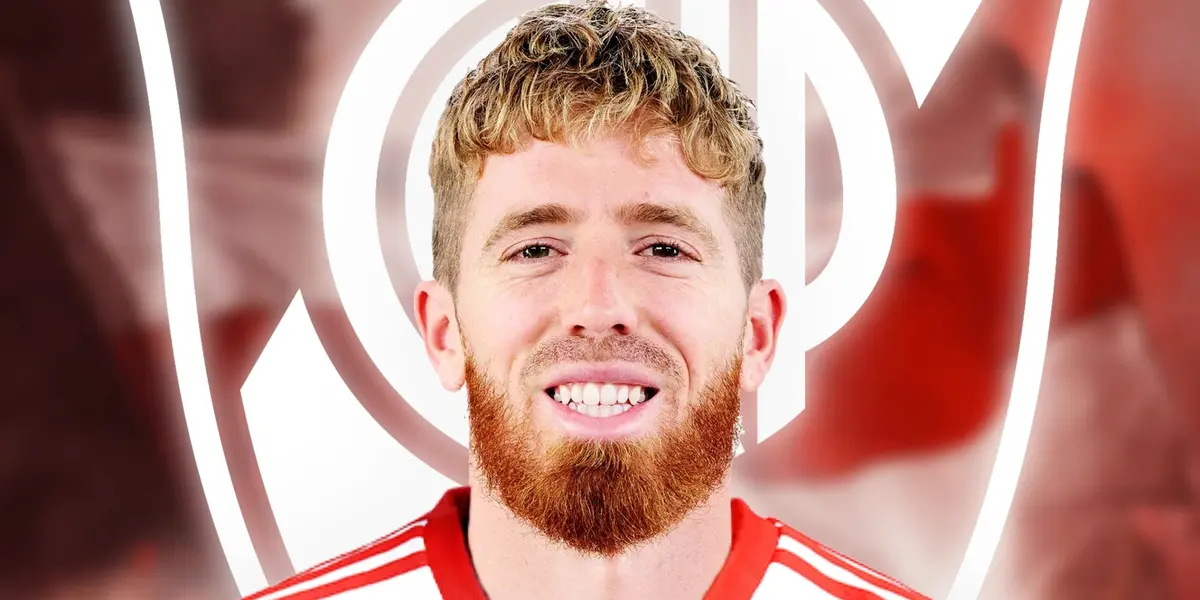 Muniain con el escudo de River de fondo.