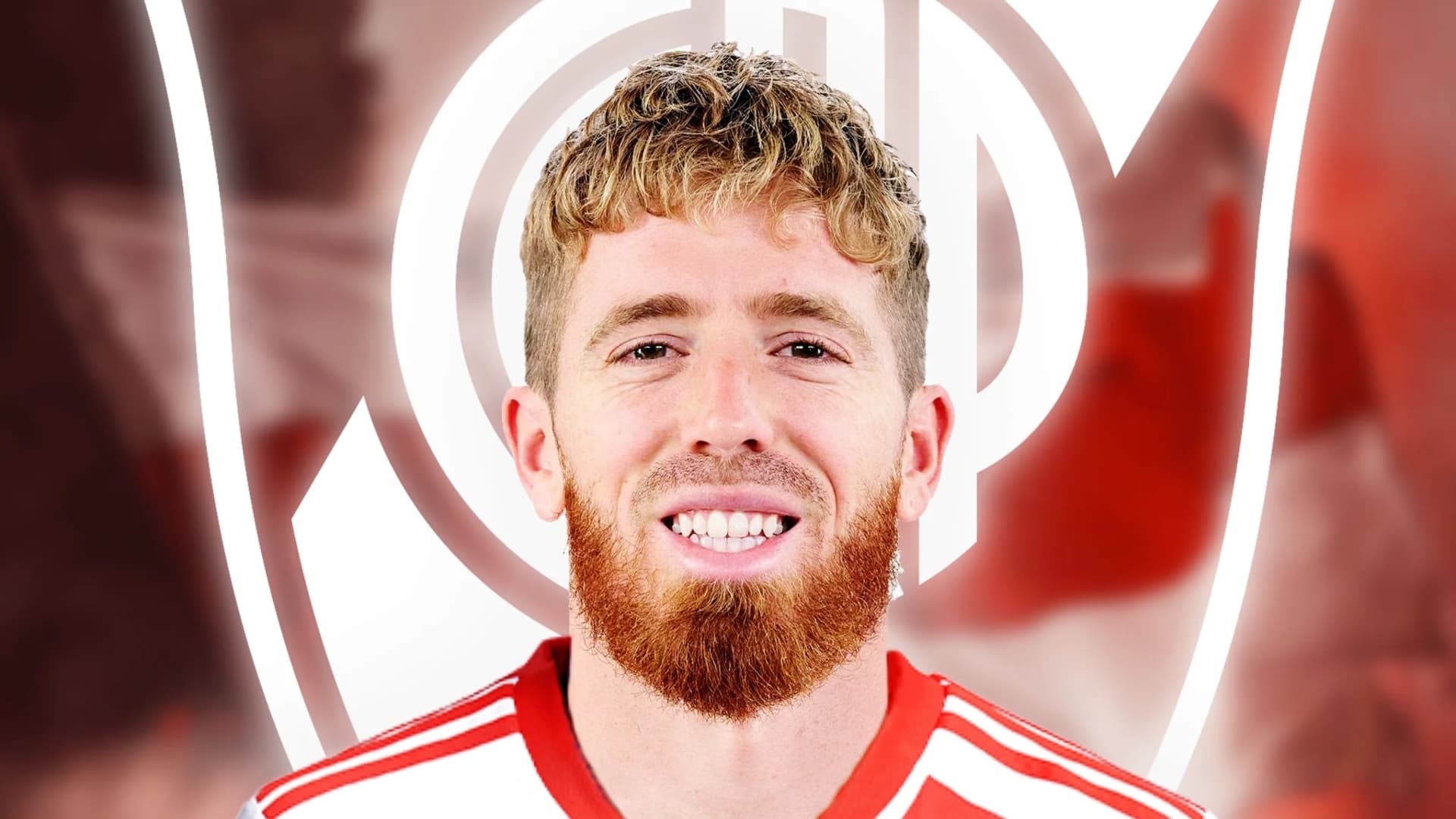 Muniain con el escudo de River de fondo.