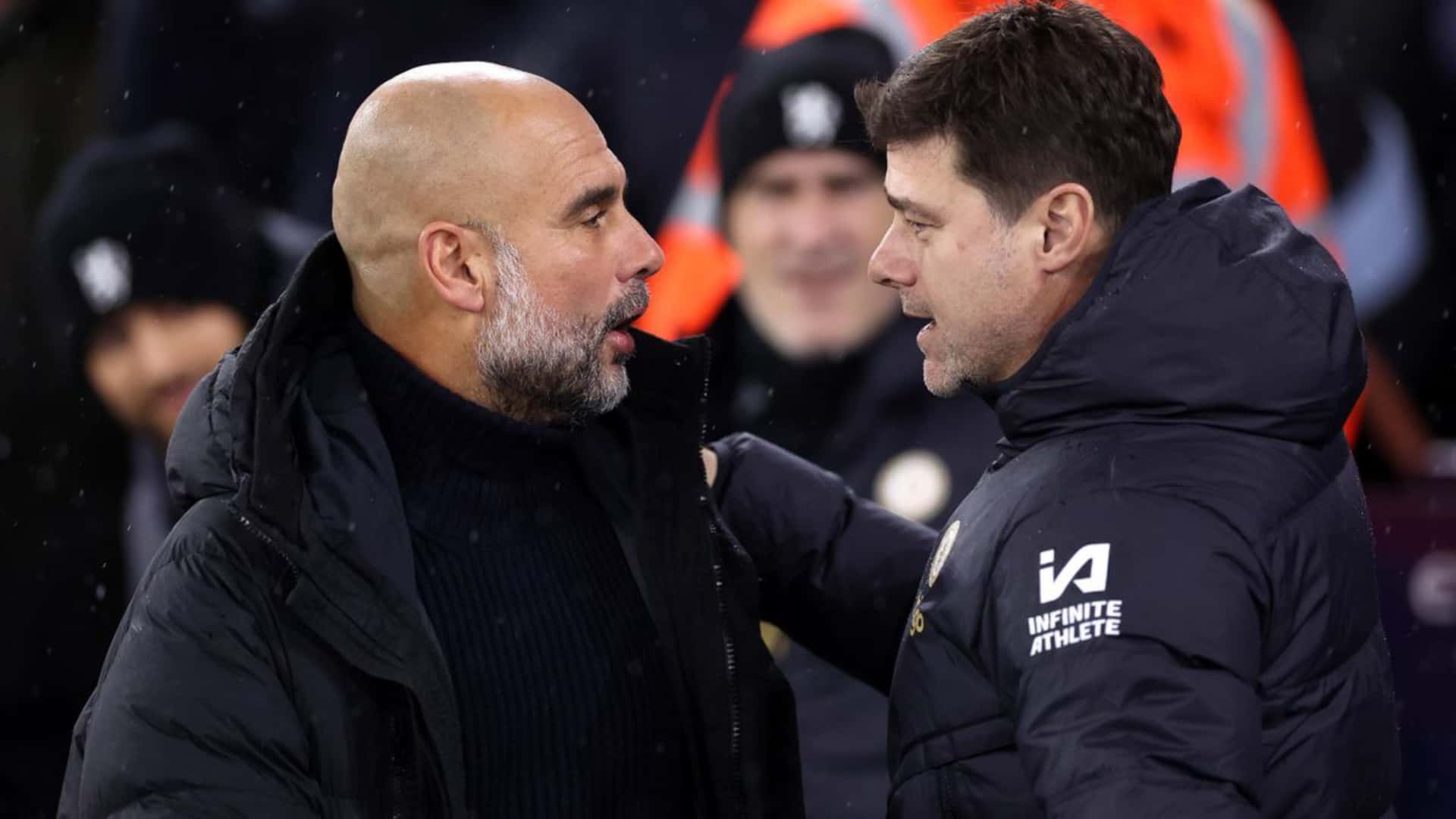 Pep Guardiola charlando con Mauricio Pochettino