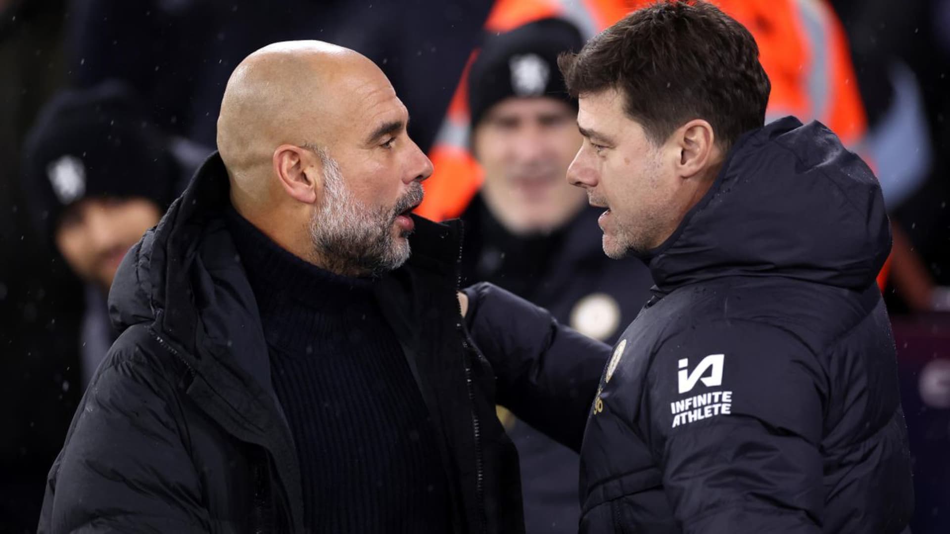 Pep Guardiola charlando con Mauricio Pochettino