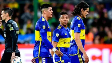 Rojo, Fabra y Cavani durante un partido de Boca.