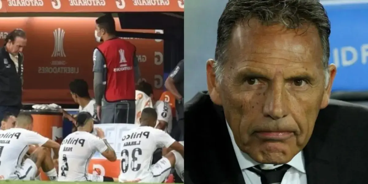 Santos en el piso escuchando a Cuca.