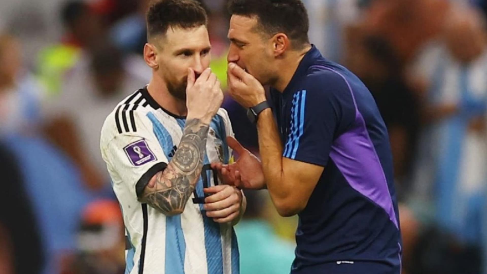 Scaloni y Messi en un partido